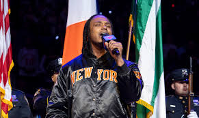 Avery Wilson performing the national anthem