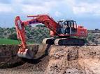 Foto escavatore a risucchio e foto lavori di aspirazione materiale