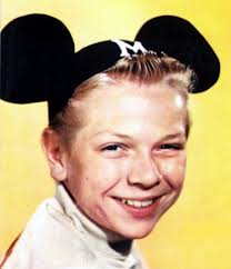 Then: Lonnie Burr (pictured here in the ears he loathed because they smushed his carefully tended pompadour) came to The Mickey Mouse Club with loads of ... - 8-mouseketeer-lonnie-in-the-first-year-ears-no-insignia-yet-on-the-mickey-mouse-club