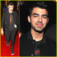 Joe Jonas steps out at the (BELVEDERE) RED launch with Usher pre-Grammy party held at Bardot in Hollywood on Thursday night (February 10). - joe-jonas-usher-grammy-party