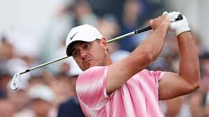 Brooks Koepka signs with the Motor City Golf Club of the TGL