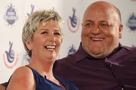 Happier times: Gillian and Adrian Bayford. A lottery winner who landed a £148million jackpot has dumped her husband for a car dealer who sold her five Audis ... - I131229_133111_181996oTextTRMRMMGLPICT000009384549o-2971161