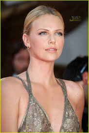 charlize theron feather duster 13 - charlize-theron-feather-duster-13