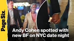 Andy Cohen holds hands with businessman Kevin Sobieski on NYC date night