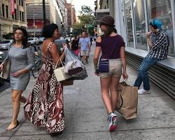 Image of person walking through a vintage shop in New York City