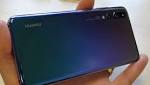 منافسة بين هاتف HUAWEI وكاميرا