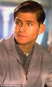 Has time stood still? Crispin Glover arrived at LAX on Monday looked markedly unlined in contrast to his appearance on Back to the Future back in 1985 - article-0-16F2D971000005DC-325_306x505