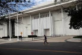 Kennedy Center exterior remains covered after Trump’s name is removed