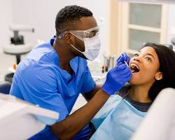 Image of dentist working on a patient