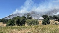 Fire lines nearly complete as crews begin mop-up on Upper Applegate Fire