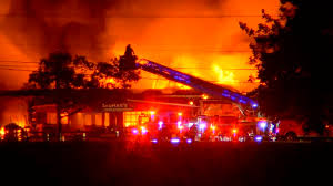 Crews work for hours to contain massive barn fire on Five Mile Line Road in Penfield