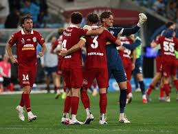 Striker seals second spot for Reds, then gets sent off