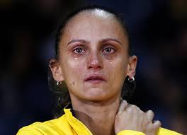 Fabiana de Oliveira of Brazil, which clinched the silver medal, cries on the podium during the award ceremony at the FIVB Women&#39;s Volleyball World ... - bs28