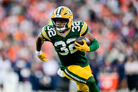 Fantasy football draft board with rising and falling player values