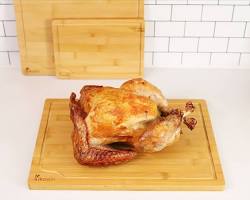 Image of roasted chicken resting on a cutting board