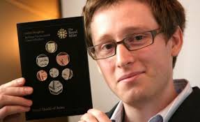 Designer Matthew Dent holds copies of the coins he designed. Matthew Dent holds copies of the coins he designed. The reverse of the new £1 shows the full ... - article-1005608-00C5DBAC00000578-983_468x286