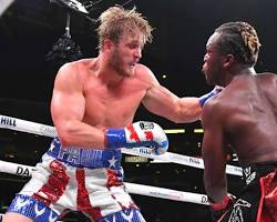 Image of Logan Paul landing a punch in a boxing match