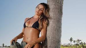NFL WAGs Take Over SI Swimsuit 2026
