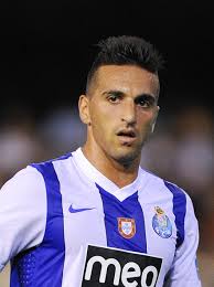 Miguel Lopes of FC Porto looks on during a Pre-Season friendly match between Valencia CF and FC Porto at Estadio ... - Miguel%2BLopes%2BValencia%2BCF%2Bv%2BFC%2BPorto%2BPre%2BSeason%2BLAerhAMujPKl