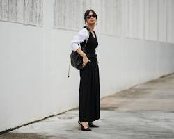 Image of woman wearing a long Aline skirt in a professional setting