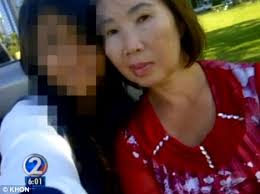 Taken away: Tammy Nguyen, 54, of Hawaii was shot to death Friday in a random act of violence on a Hawaii highway, police said - article-1394506-0C6AC4E700000578-596_468x350