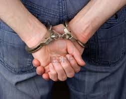 Image result for handcuffs on hands