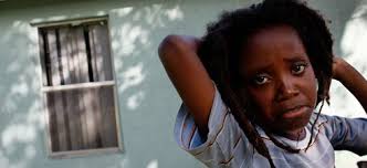 Ezekiel Pierre Sejour stands in front of an empty, foreclosed home that he and his mother Marie Nadine Pierre, were moved into by the Miami group Take Back ... - worsethanyouthink