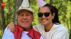 Bruce Willis and Emma Heming Willis together at a celebration