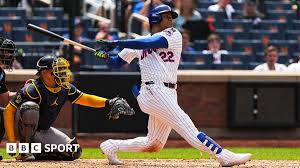 William Contreras hits a home run during the game