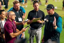 Why a Journalist's Encouragement to an NFL Coach Sparked Debate