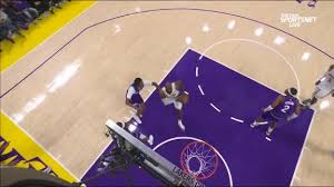 LeBron James gets the basket plus the foul