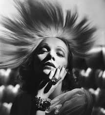 circa 1937: German-born actress Marlene Dietrich (1901 – 1992) wearing an exotic headdress designed by Travis Banton for the film &#39;Angel&#39;, directed by Ernst ... - george-hurrells-hollywood-glamour-portraits-1925-1992-1