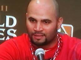 Meet Albert Pujols, new master of the understatement. After slugging a record-tying, yet otherwise meaningless, three home runs on Saturday night, ... - Albert-Pujols-press-conference