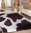 Cow print area rug