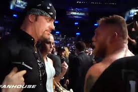 Image result for brock smiles at undertaker