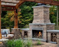 Image of outdoor kitchen with a fireplace