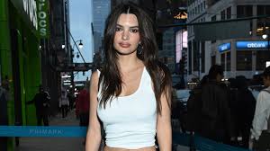 Emily Ratajkowski's shredded red birthday dress leaves little to the imagination at NYC celebration
