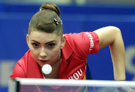 <b>Bernadette Szocs</b> of Romania plays against Xiaona Shan of Germany. - 183576704-bernadette-szocs-of-romania-plays-against-gettyimages