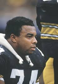 Closeup of Pittsburgh Steelers Terry Long on bench during game vs.