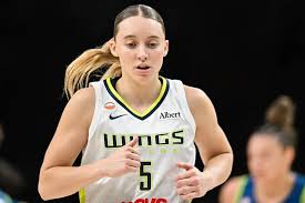 Dallas Wings and Seattle Storm players during a WNBA game