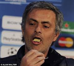 PICTURE SPECIAL: Jose Mourinho takes the biscuit! The Special One hob nobs in press conference ahead ... - article-0-08BAF12B000005DC-850_468x418