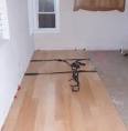 Installing a hardwood floor over a concrete slab