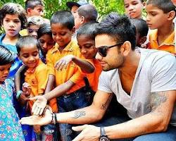 Virat Kohli with kids at his Virat Kohli Foundation