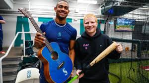 Pop megastar warms up for Seattle concert by taking BP with J-Rod