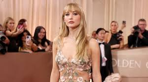 Jennifer Lawrence Knows She’s ‘Naked’ in Her Sheer Floral Dress at the Golden Globes