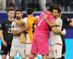 Iran twice come from behind to claim draw in World Cup opener with New Zealand