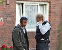 Image of person talking to a local person on the street