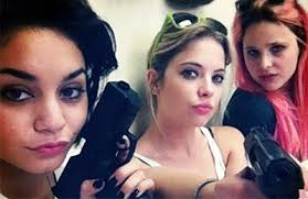 ... Breakers is as beautiful as it is bewildering. Its heist scene might be the best few minutes of cinema I&#39;ve seen in years. Brit (Ashley Benson) and ... - spring-breakers-guns