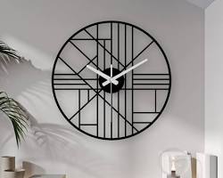 Unique asymmetrical metal wall clock with irregular frame by Hodor Designs. Modern creative art piece wall clock for trendy Indian interiors.