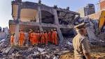 killed, many feared trapped rubble